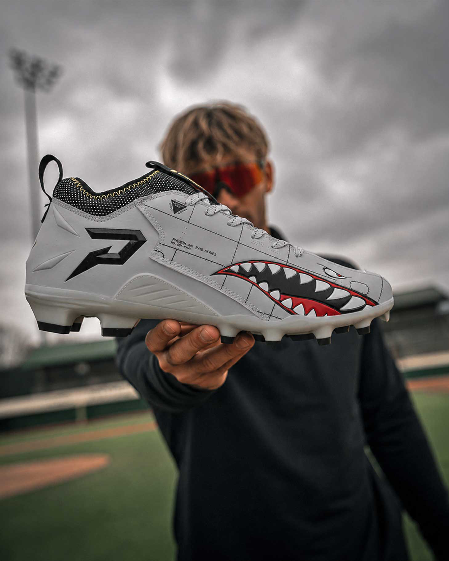 Phenom Air Raid Series baseball cleat with shark-tooth design