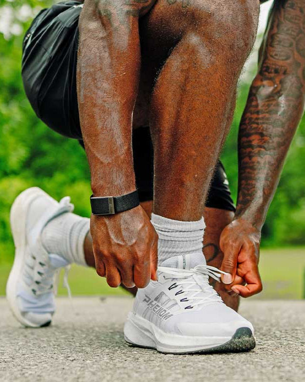 Phenom lifestyle trainer being laced up